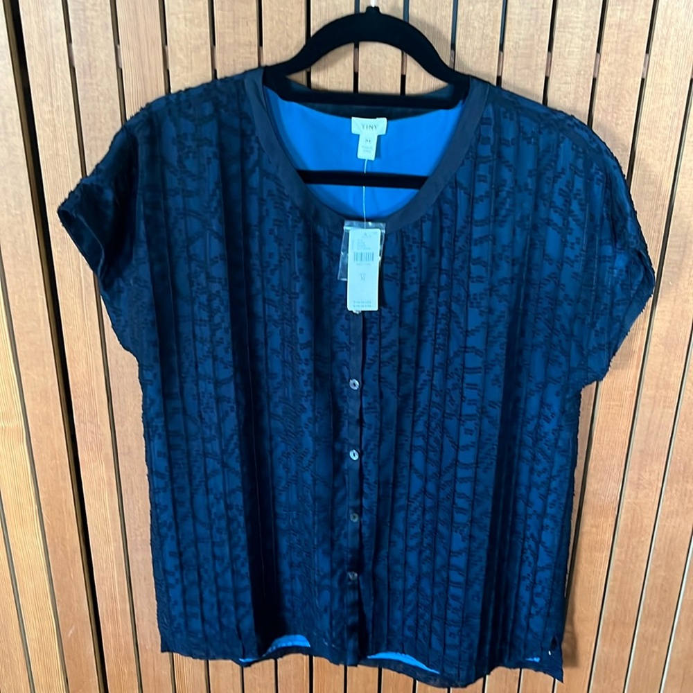Anthropology navy cap sleeve top. New, sized medium